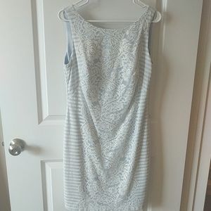 Beautiful white lace on baby blue sleeveless dress